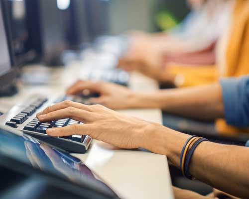 Hands using a keyboard